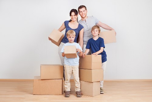 Local movers handling furniture during Barnet house removals