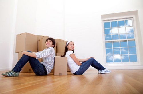 Barnet moving van loading furniture carefully