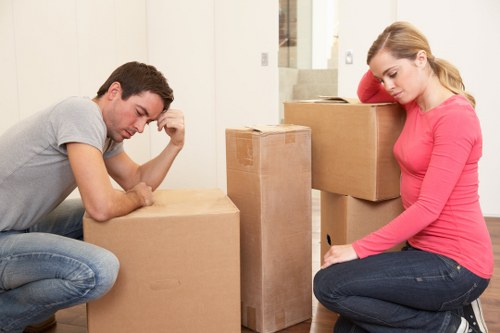 Professional movers transporting office items during a Barnet commercial move