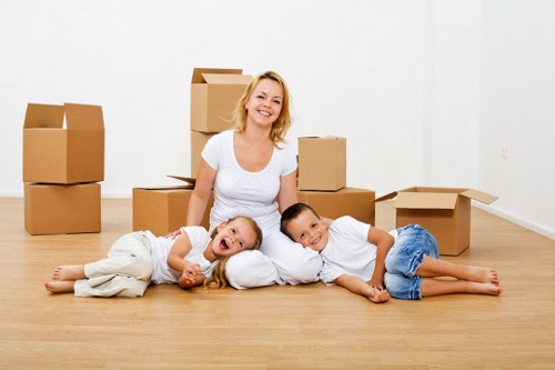 Packed boxes and bedroom items prepared for student removals in Barnet