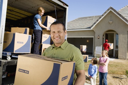 Local man and van loading items for transport in Barnet